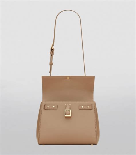 ysl le fermoir|Quiet Luxury: What Fits in the YSL Le Fermoir Top Handle Bag.